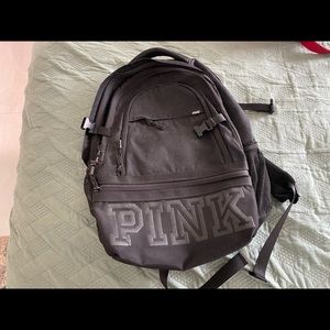 Pink black backpack